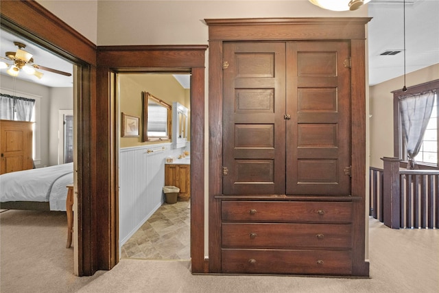 403 S Royall, Palestine, TX 75801 - corridor with light colored carpet, wainscoting, and baseboards