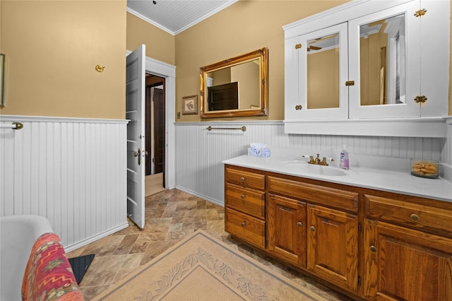 403 S Royall, Palestine, TX 75801 - bathroom with a wainscoted wall, vanity, and crown molding