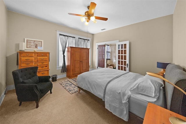 403 S Royall, Palestine, TX 75801 - bedroom with light carpet, a ceiling fan, and baseboards