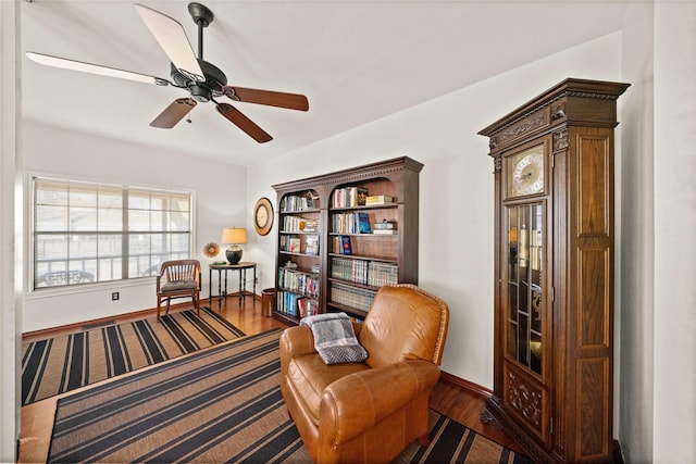 403 S Royall, Palestine, TX 75801 - living area with wood finished floors, baseboards, and a ceiling fan