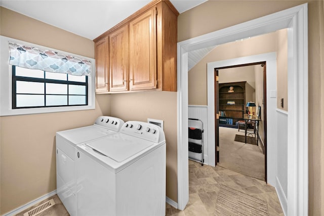 403 S Royall, Palestine, TX 75801 - clothes washing area featuring cabinet space and washer and dryer