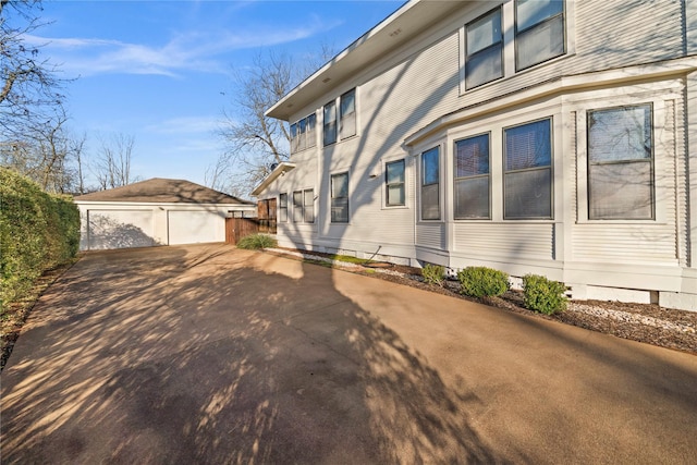 403 S Royall, Palestine, TX 75801 - view of side of home featuring an outdoor structure, a garage, and crawl space