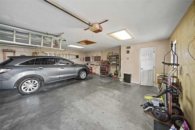 403 S Royall, Palestine, TX 75801 - garage featuring a garage door opener