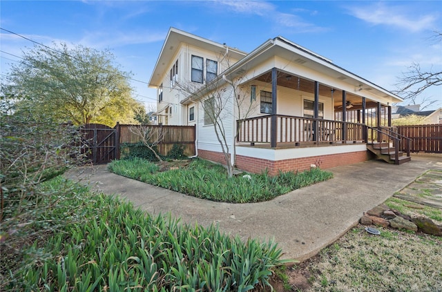 403 S Royall, Palestine, TX 75801 - view of front facade featuring fence, ceiling fan, and a porch