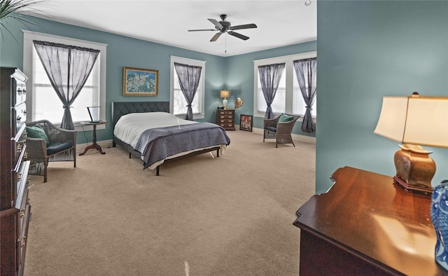 403 S Royall, Palestine, TX 75801 - bedroom with baseboards, carpet floors, and ceiling fan