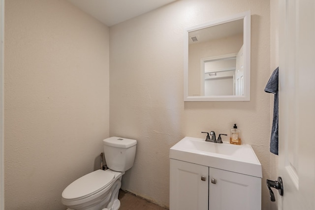 707 Kyle Dr, Arlington, TX 76011 - half bathroom featuring toilet and vanity
