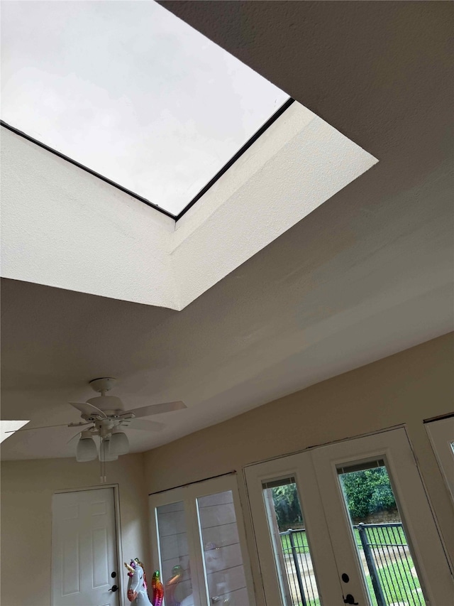 707 Kyle Dr, Arlington, TX 76011 - detailed view of a skylight and ceiling fan