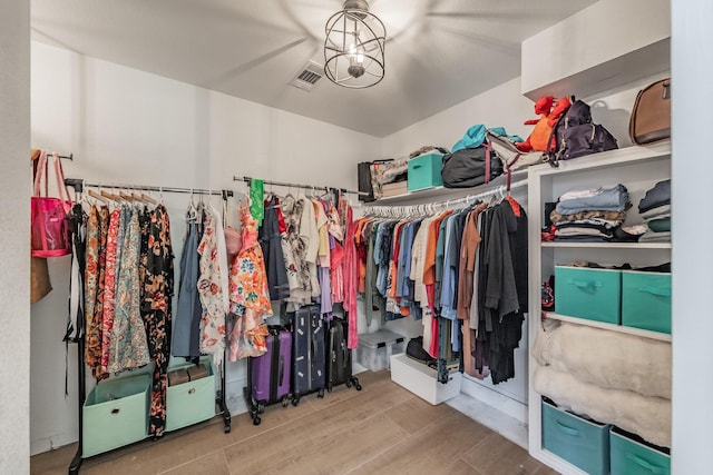 707 Kyle Dr, Arlington, TX 76011 - spacious closet featuring wood finished floors