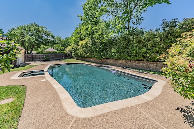 707 Kyle Dr, Arlington, TX 76011 - view of swimming pool with a fenced backyard, a patio area, and a pool with connected hot tub
