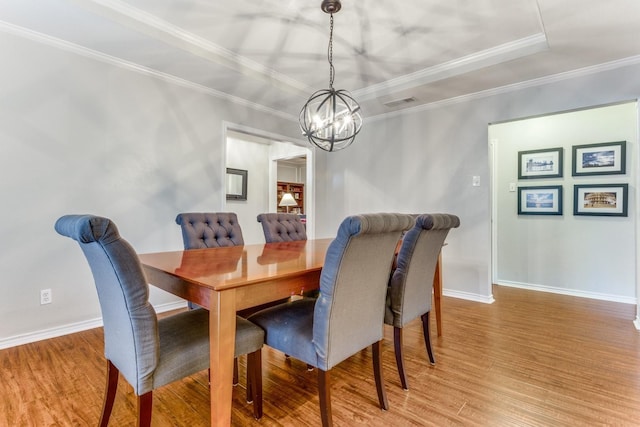 10014 Silver Creek Rd, Dallas, TX 75243 - dining area with a chandelier, wood finished floors, ornamental molding, and baseboards