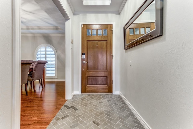 10014 Silver Creek Rd, Dallas, TX 75243 - entryway featuring brick floors, ornamental molding, and baseboards