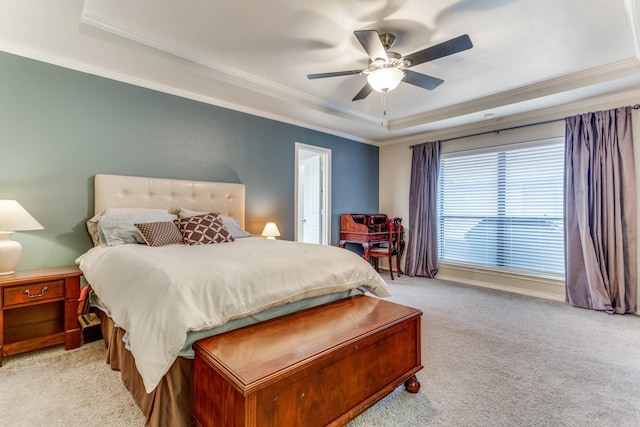10014 Silver Creek Rd, Dallas, TX 75243 - carpeted bedroom featuring a tray ceiling, ornamental molding, and ceiling fan