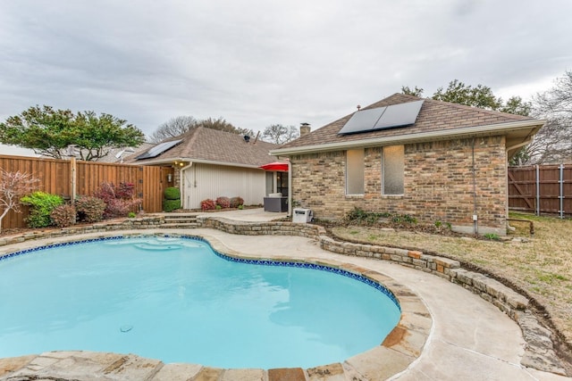 10014 Silver Creek Rd, Dallas, TX 75243 - view of swimming pool featuring a patio and a fenced backyard