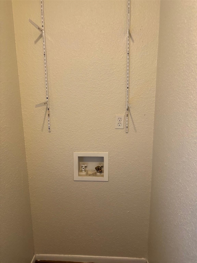 437 Browning Dr, Arlington, TX 76010 - laundry room featuring hookup for a washing machine and baseboards