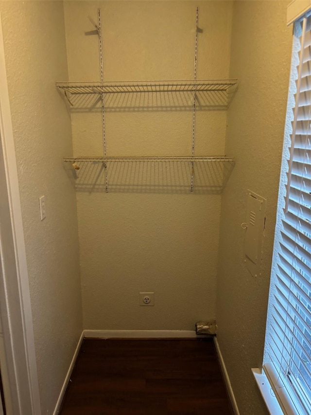 437 Browning Dr, Arlington, TX 76010 - spacious closet with dark wood finished floors and electric panel