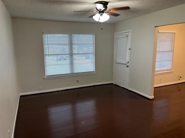 437 Browning Dr, Arlington, TX 76010 - empty room featuring ceiling fan, a textured ceiling, wood finished floors, and baseboards