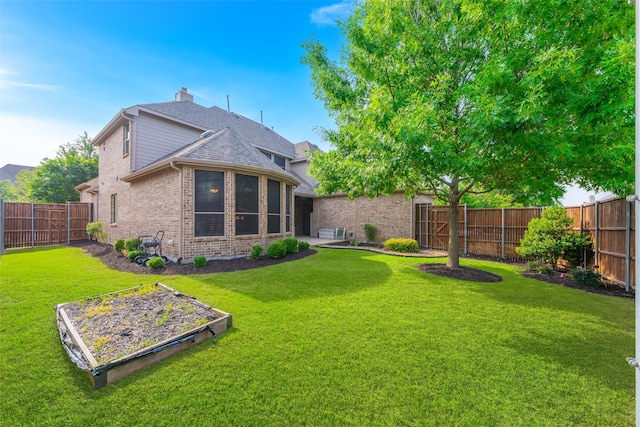 8803 Kelvington Dr, Frisco, TX 75035 - view of yard with a garden