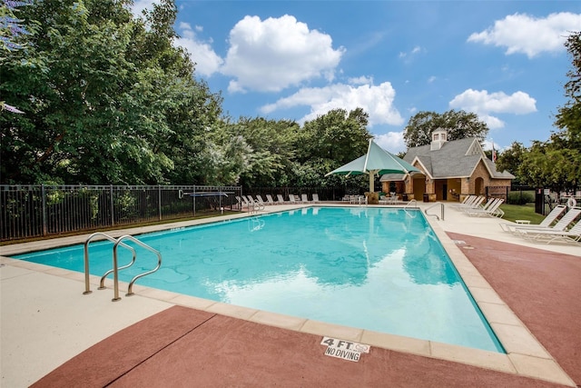 8803 Kelvington Dr, Frisco, TX 75035 - community pool featuring a patio and fence