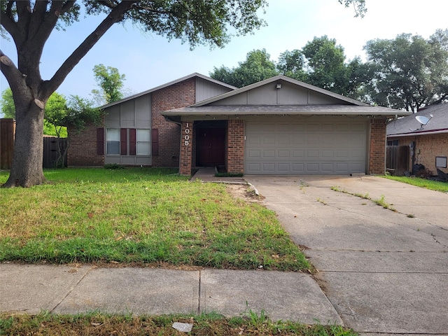 1005 Via Balboa, Mesquite, TX 75150 - view of front of property featuring brick siding, concrete driveway, and a garage