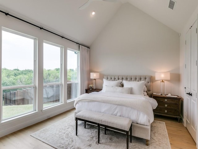 4837 Cumberland Cir, Carrollton, TX 75010 - bedroom featuring light wood finished floors, high vaulted ceiling, and recessed lighting