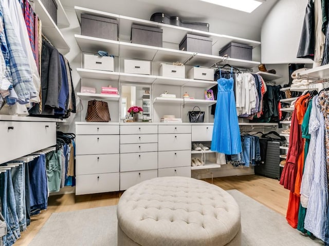 4837 Cumberland Cir, Carrollton, TX 75010 - walk in closet featuring wood finished floors