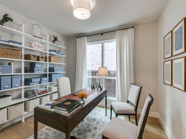 4837 Cumberland Cir, Carrollton, TX 75010 - office area featuring light wood finished floors and baseboards