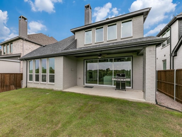 4837 Cumberland Cir, Carrollton, TX 75010 - back of house with brick siding, a patio, a ceiling fan, a chimney, and roof with shingles