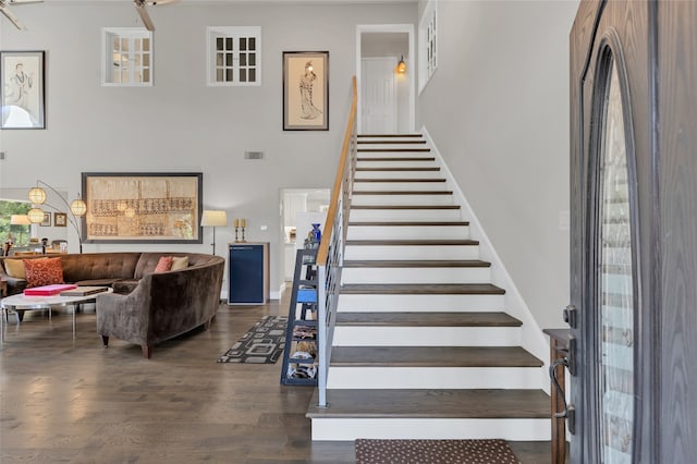 3405 Waterview Trl, Rockwall, TX 75087 - stairway with a towering ceiling and wood finished floors