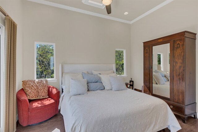 3405 Waterview Trl, Rockwall, TX 75087 - bedroom with ornamental molding, dark wood finished floors, and a ceiling fan