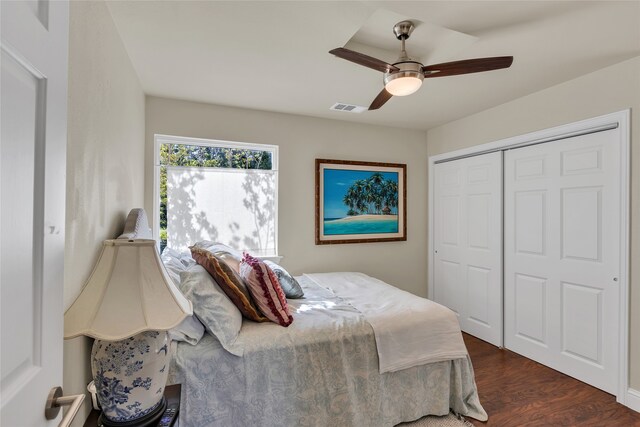 3405 Waterview Trl, Rockwall, TX 75087 - bedroom with dark wood finished floors, a closet, and ceiling fan