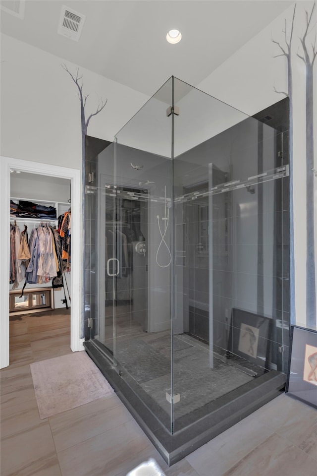 3405 Waterview Trl, Rockwall, TX 75087 - bathroom featuring a spacious closet, a stall shower, and recessed lighting