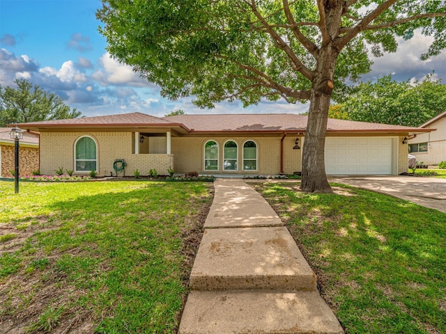 4029 Aragon Dr, Fort Worth, TX 76133 - ranch-style house with a garage, driveway, a front lawn, and brick siding
