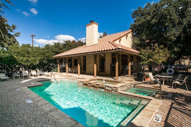 7640 W Greenway Blvd Unit 5P, Dallas, TX 75209 - community pool with an in-ground hot tub, a patio area, and fence