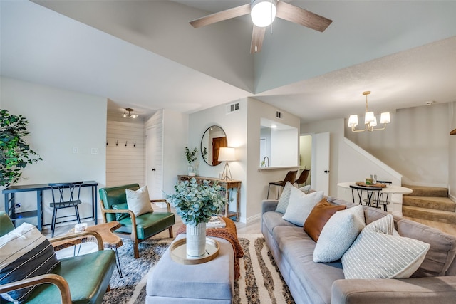 7640 W Greenway Blvd Unit 5P, Dallas, TX 75209 - living room featuring stairs, a chandelier, baseboards, a ceiling fan, and wood finished floors