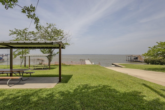 210 Harbor Dr, Gun Barrel City, TX 75156 - view of green lawn featuring a water view