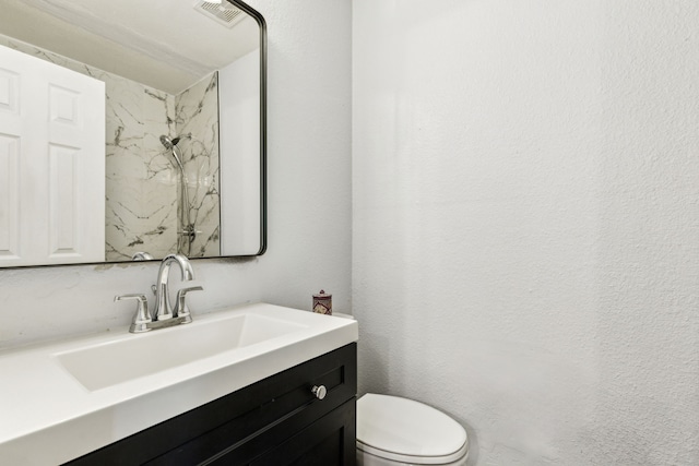 3843 Bernal Dr, Dallas, TX 75212 - bathroom with vanity and toilet