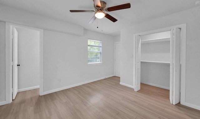 1413 Shelburne St, Waco, TX 76711 - unfurnished bedroom featuring wood finished floors, baseboards, a ceiling fan, and a closet