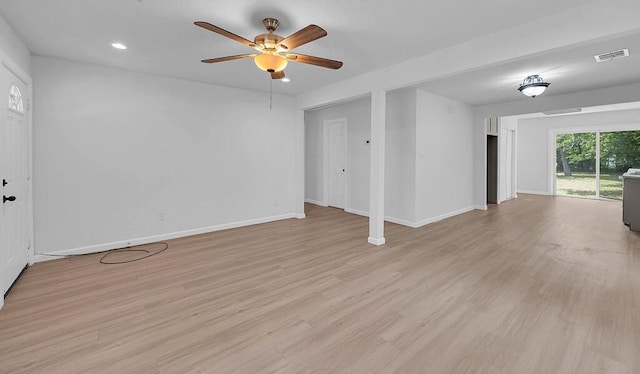 1413 Shelburne St, Waco, TX 76711 - unfurnished living room with a ceiling fan, light wood-type flooring, baseboards, and recessed lighting