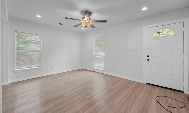1413 Shelburne St, Waco, TX 76711 - foyer with a ceiling fan, healthy amount of natural light, light wood-style floors, baseboards, and recessed lighting