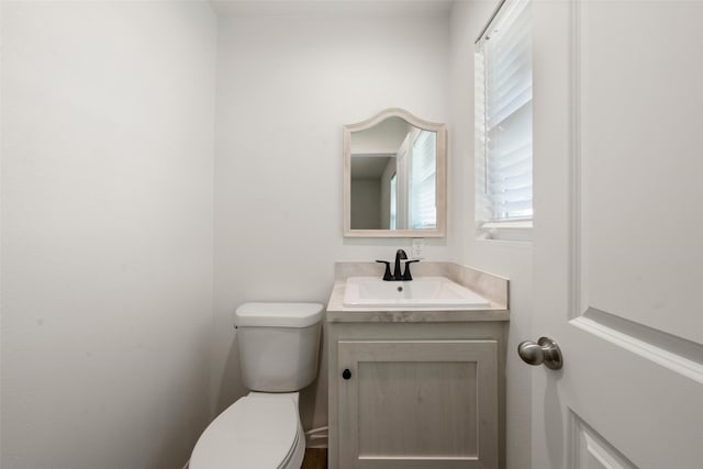 527 Dison Dr, Waco, TX 76706 - half bathroom with toilet and vanity