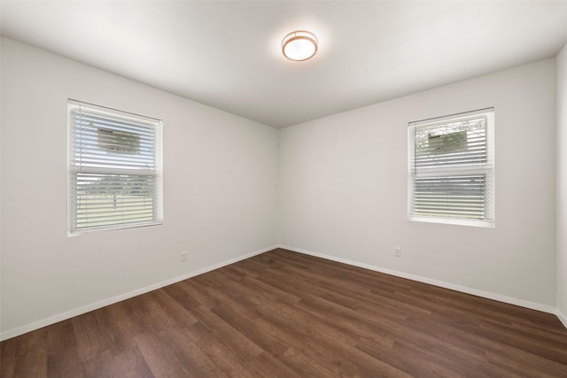 527 Dison Dr, Waco, TX 76706 - empty room featuring dark wood finished floors and baseboards