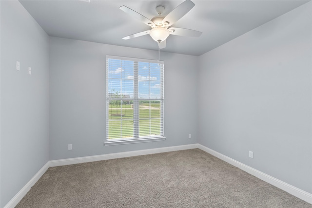 12198 Briargove Ln, Talty, TX 75126 - empty room with ceiling fan, carpet floors, healthy amount of natural light, and baseboards