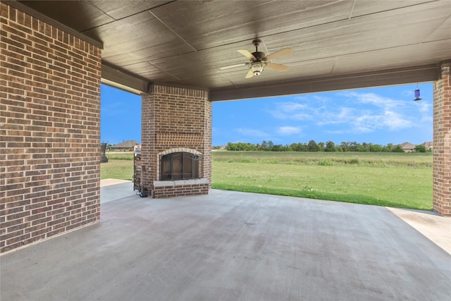 12198 Briargove Ln, Talty, TX 75126 - view of patio featuring an outdoor brick fireplace and ceiling fan