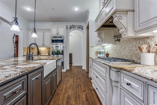 1716 Caman Park Dr, Lucas, TX 75002 - kitchen with white cabinets, stainless steel appliances, dark wood finished floors, light stone countertops, and recessed lighting