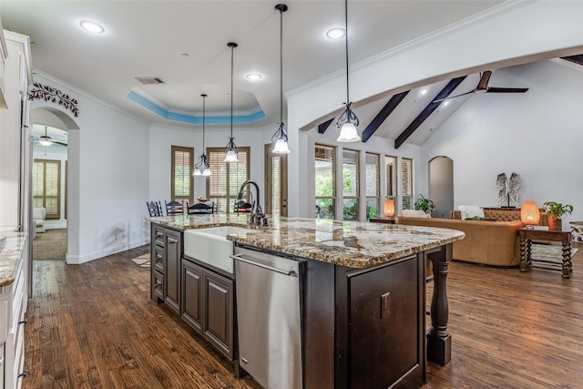 1716 Caman Park Dr, Lucas, TX 75002 - kitchen featuring dishwasher, ceiling fan, arched walkways, a sink, and a breakfast bar area