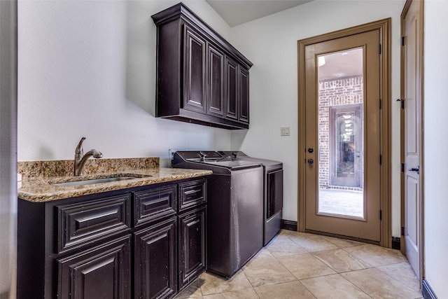 1716 Caman Park Dr, Lucas, TX 75002 - laundry area featuring separate washer and dryer, cabinet space, healthy amount of natural light, and light tile patterned floors