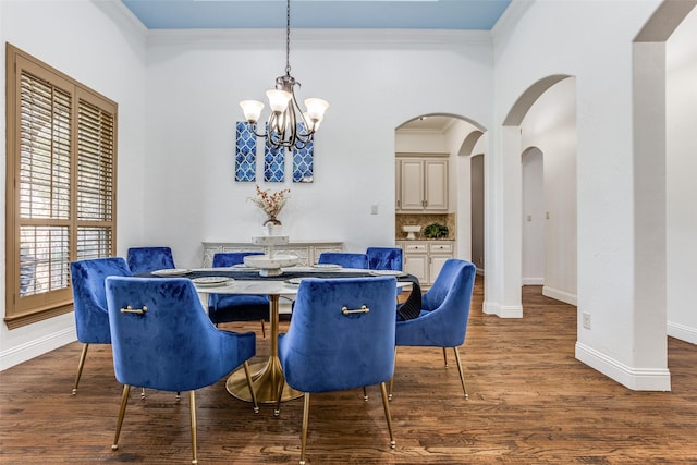 1716 Caman Park Dr, Lucas, TX 75002 - dining room featuring a chandelier, ornamental molding, arched walkways, baseboards, and wood finished floors