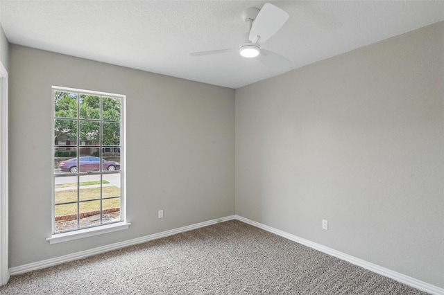 700 Brentwood Ln, Richardson, TX 75080 - unfurnished room featuring carpet flooring, ceiling fan, baseboards, and a textured ceiling