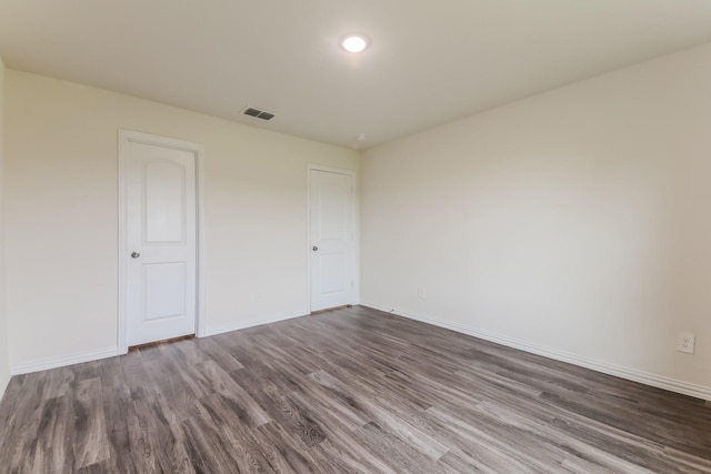 155 Westview Dr, Gun Barrel City, TX 75156 - unfurnished bedroom with dark wood-style flooring and baseboards