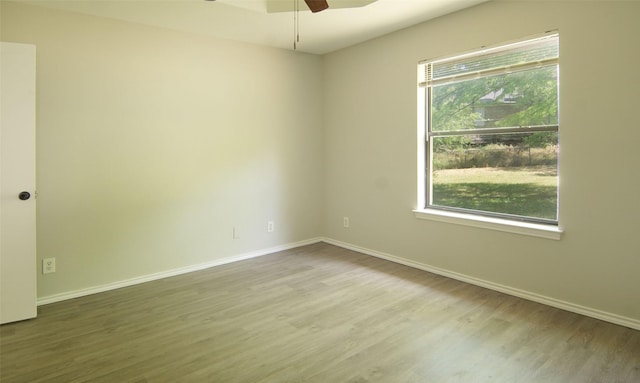 602 Valleyridge Ct, Decatur, TX 76234 - unfurnished room featuring wood finished floors, ceiling fan, and baseboards